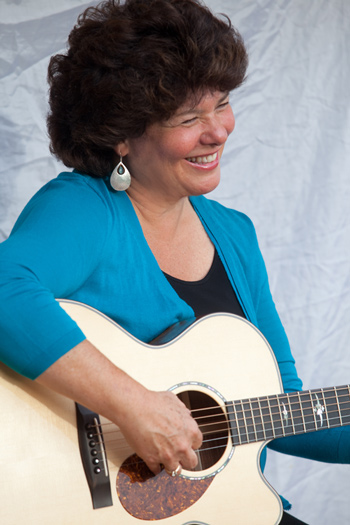 Ilene with guitar at Shalshelet